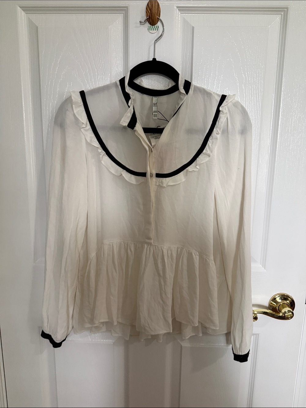 Delicate White Ruffle Peasant Blouse with Black Trim